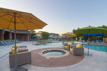 Hot tub and pool at The Madison of Tyler Apartment Homes in Tyler, TX